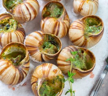 Baked snails with garlic butter and fresh herbs